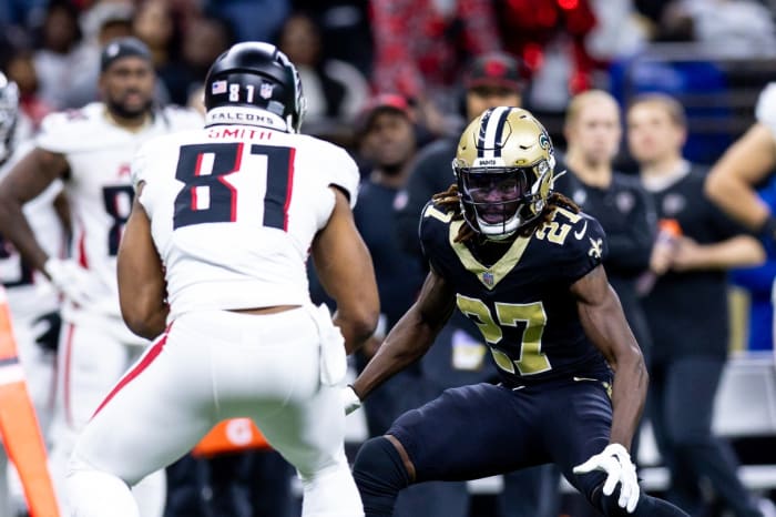 Atlanta Falcons tight end Jonnu Smith (81) rushes against New Orleans Saints cornerback Isaac Yiadom (27).